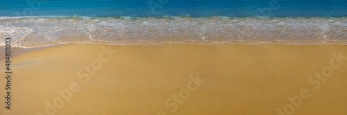 Top view aerial image from above of stunning beautiful sea landscape sand beach with turquoise water with copy space for your text. Vacation by sea  travel concept. Banner