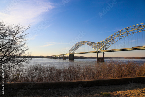 Photography a breathtaking shot of the Memphis-Arkansas Bridge over the flowing waters of t