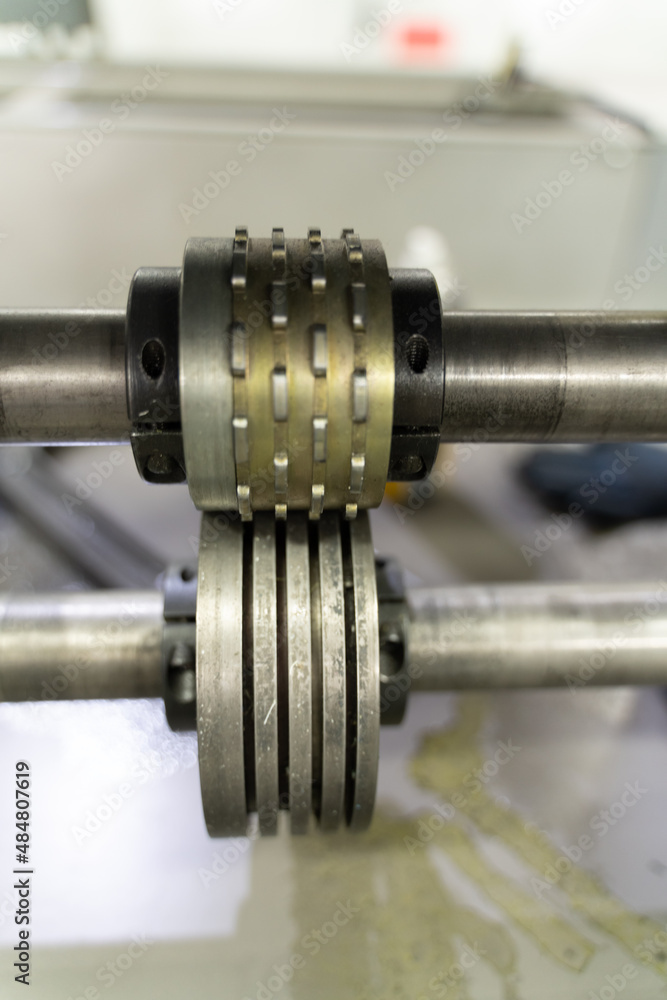 Close up of factory machine moving part