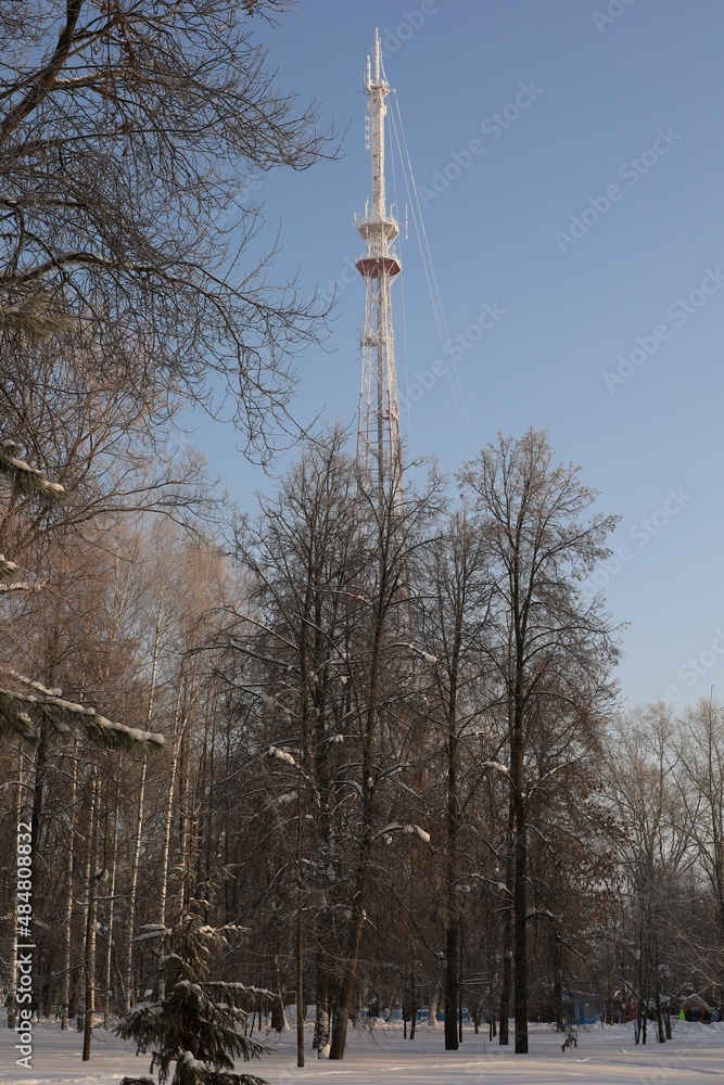 Obraz premium high TV tower on the background of blue sky