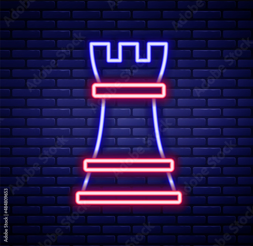 Obraz na płótnie Glowing neon line Chess icon isolated on brick wall background
