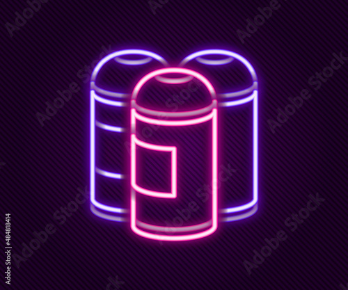 Glowing neon line Paint spray can icon isolated on black background. Colorful outline concept. Vector