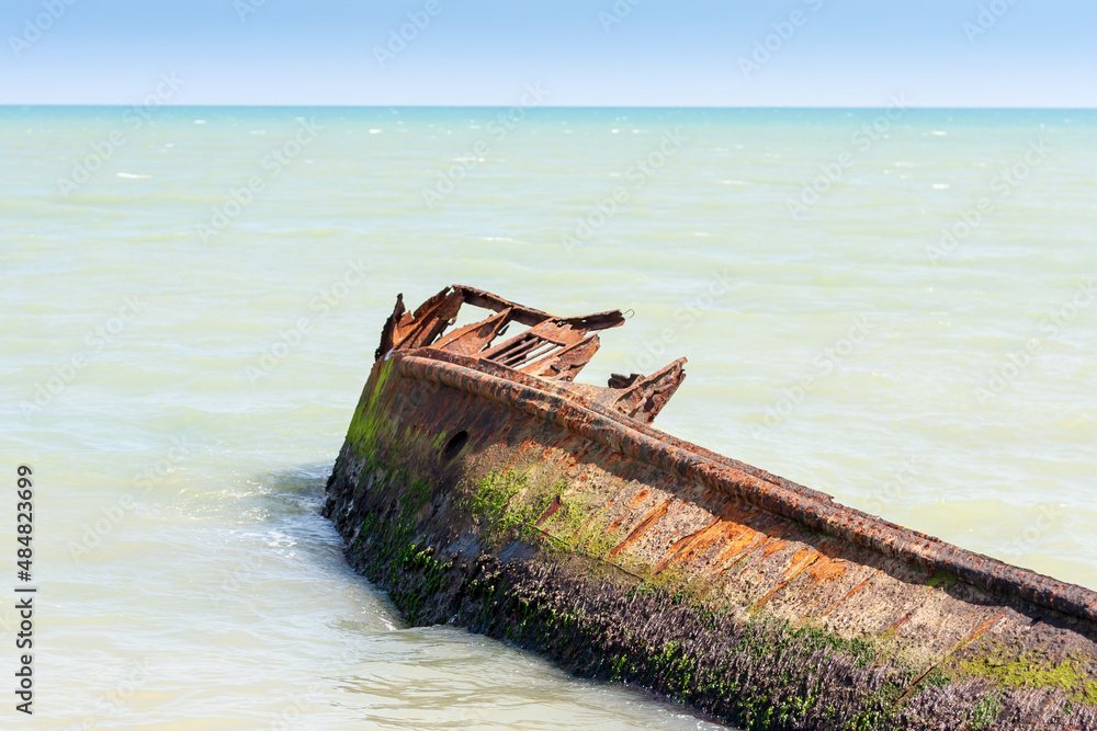Rusted ship wreck in sea
