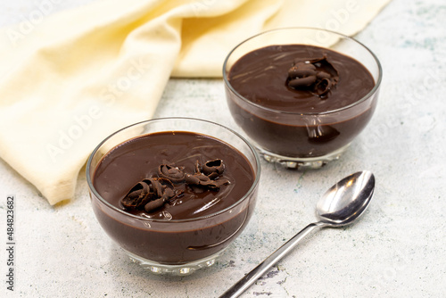 Supangle dessert on gray background. A chocolate pudding with a semi-solid, semi-liquid consistency. photo