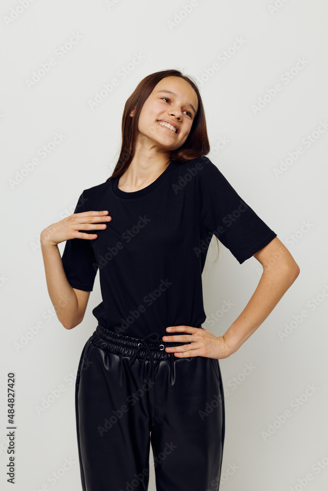 photo pretty girl in a black t-shirt hand gesture fun Lifestyle unaltered photo pretty girl in a black t-shirt hand gesture fun Lifestyle unaltered