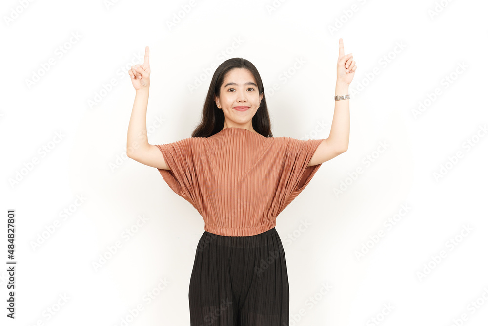 Showing Product and Pointing Up Of Beautiful Asian Woman Isolated On White Background Showing Product and Pointing Up Of Beautiful Asian Woman Isolated On White Background