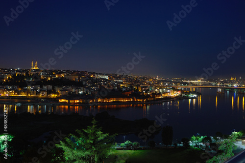 View of the sea bay Golden Horn  the city at night  in the houses with the lights on. Journey to istanbul