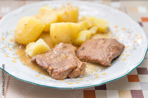 Polish traditional bitki wolowe (beef cutlets) with potatoes.