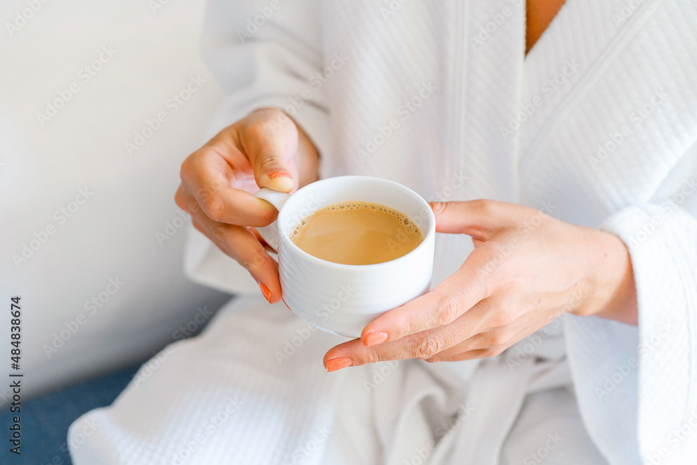 Close up of a person holding a cup Close up of a person holding a cup