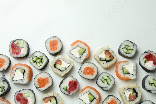 Concept of tasty food with sushi rolls, space for text
