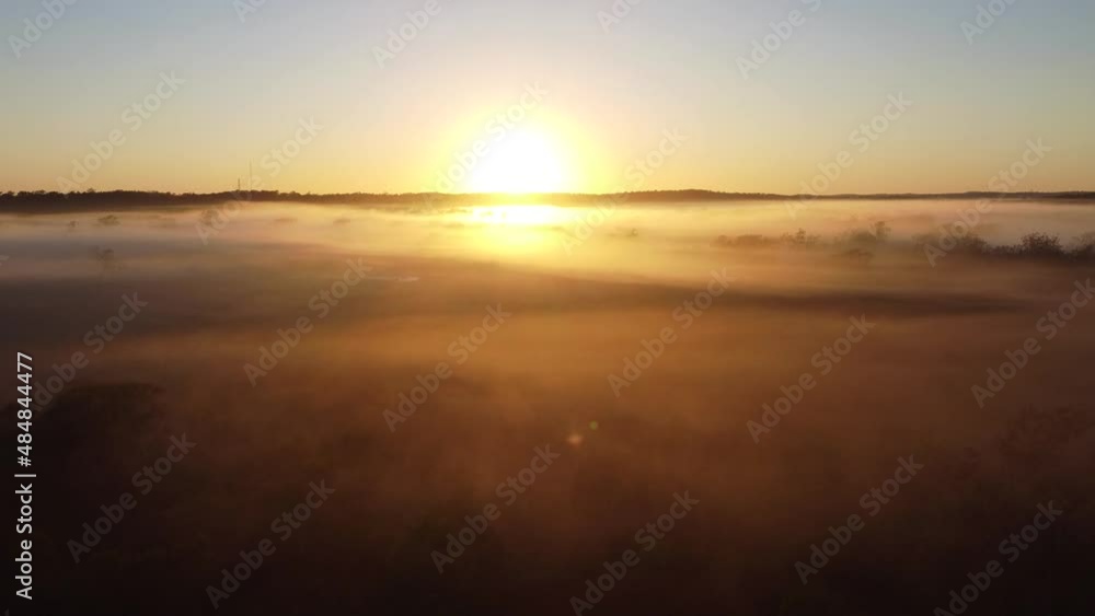Rising through cloud to reveal golden valley sunrise Rising through cloud to reveal golden valley sunrise