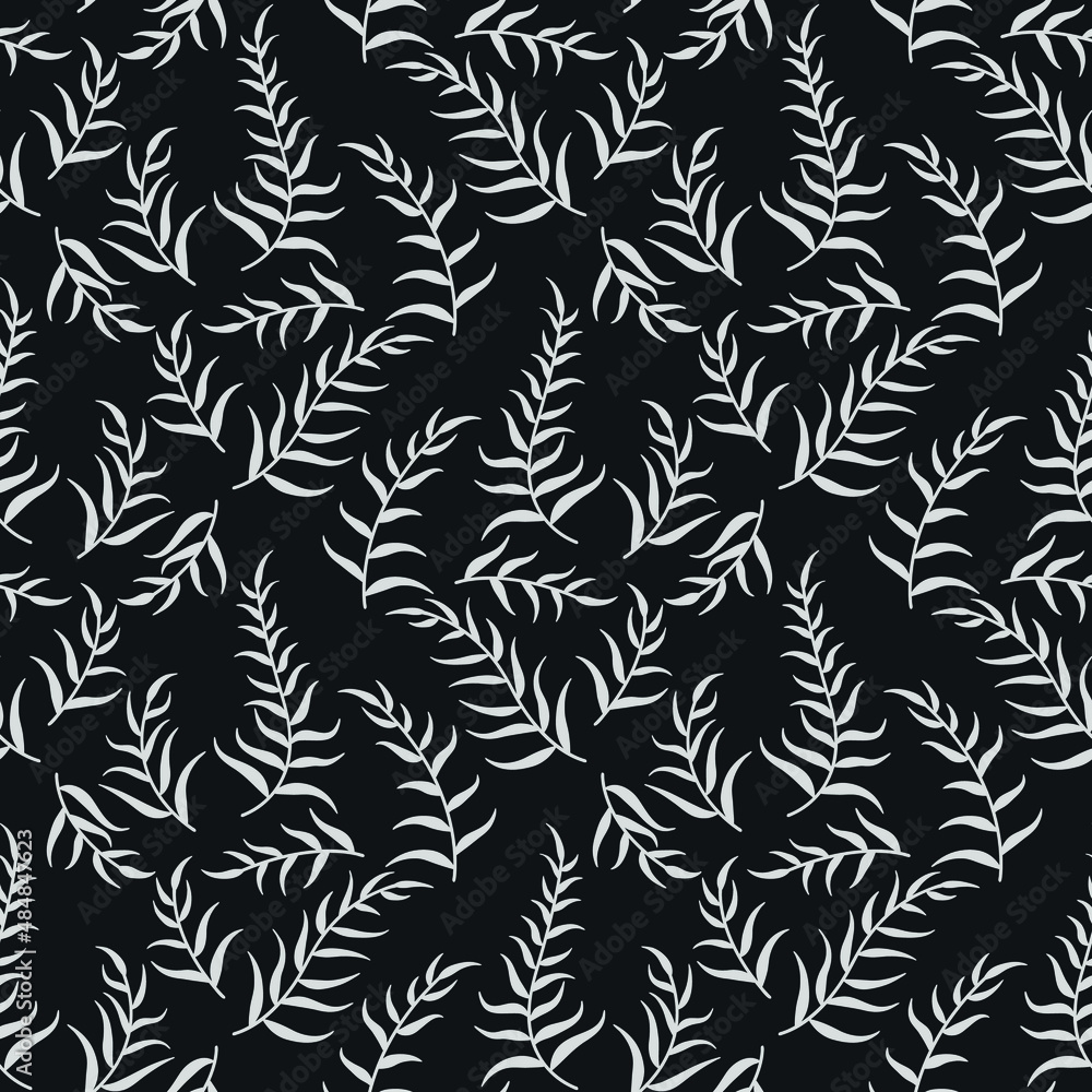 white tropical leaves on dark background white tropical leaves on dark background