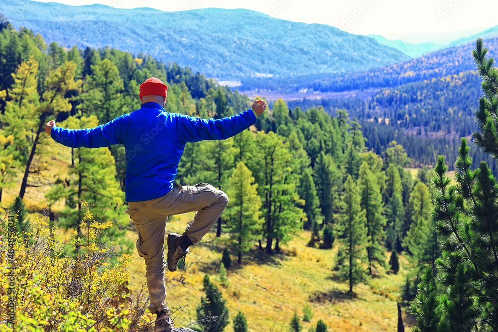 buddhism meditation travel, man doing yoga in traditional yellow pants in nature buddhism meditation travel, man doing yoga in traditional yellow pants in nature