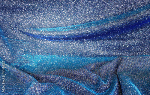 background of beautiful dark blue glitter fabric
