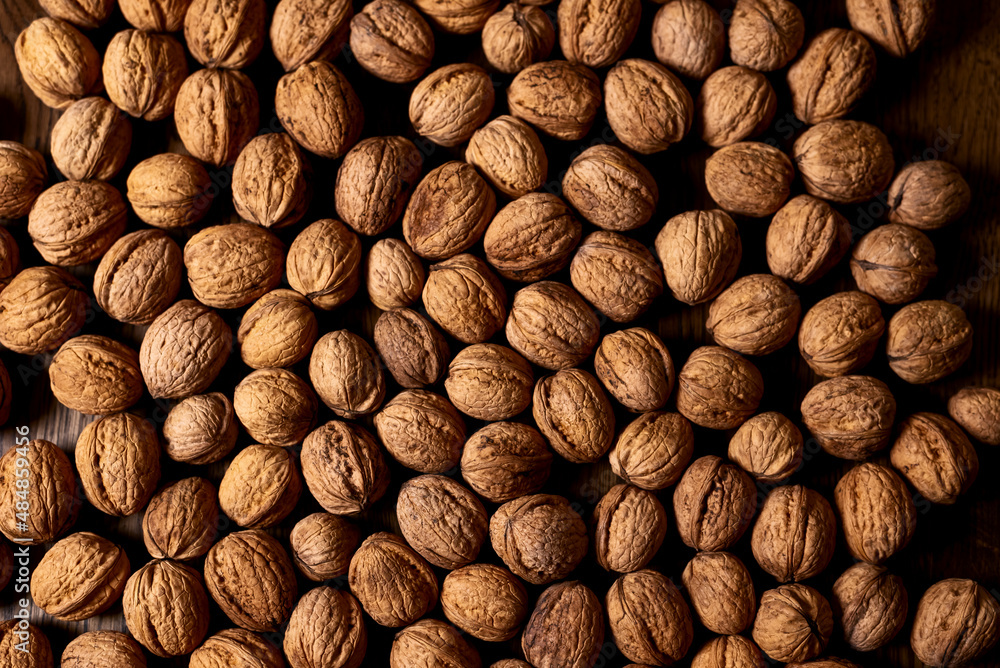 Several walnuts are on the table. Several walnuts are on the table.