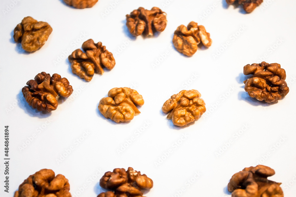 Stack of walnuts on white background Stack of walnuts on white background
