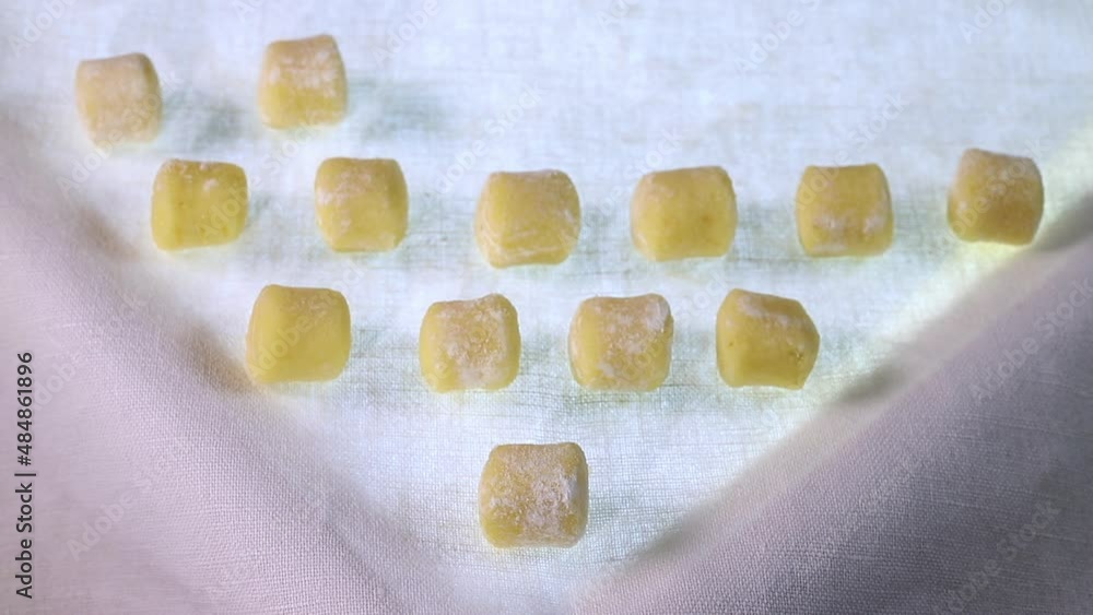 Rows of uncooked gnocchi , dumpling.mov Rows of uncooked gnocchi , dumpling.mov