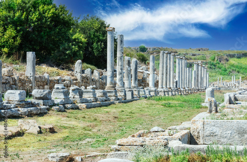 Ancient city of Perge near Antalya Turkey. Columned street and ruins.. Believed to have been built in the 12th to 13th centuries BC. Blue Sky.