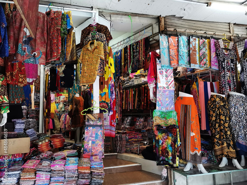Traditional clothing thai southern or batik clothes for thai people and foreign travelers travel visit and select buy at local antique vintage retro shop on December 31, 2017 in Phatthalung, Thailand