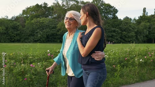 Cinematic and storytelling video of a granddaughter and her grandmother spending time together. Young woman visiting her grandmother. Concept about health care, family and lifestyle.