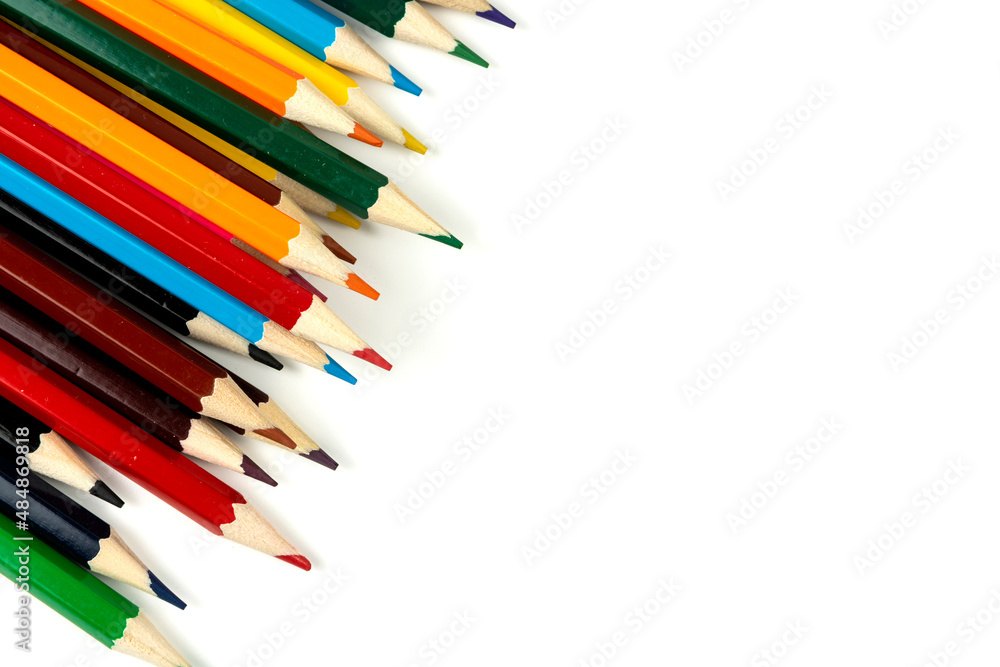Colored pencils isolated on white background. close-up, copy space Colored pencils isolated on white background. close-up, copy space