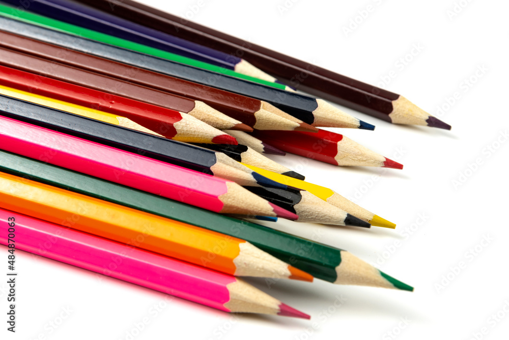 Colored pencils isolated on white background. close-up, copy space Colored pencils isolated on white background. close-up, copy space