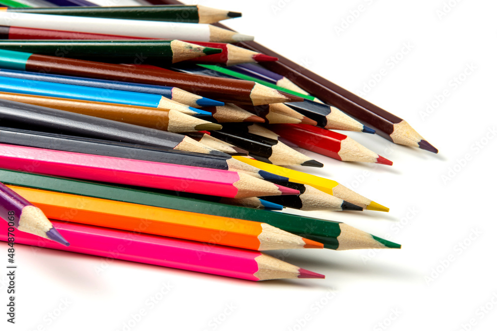 Colored pencils isolated on white background. close-up, copy space Colored pencils isolated on white background. close-up, copy space