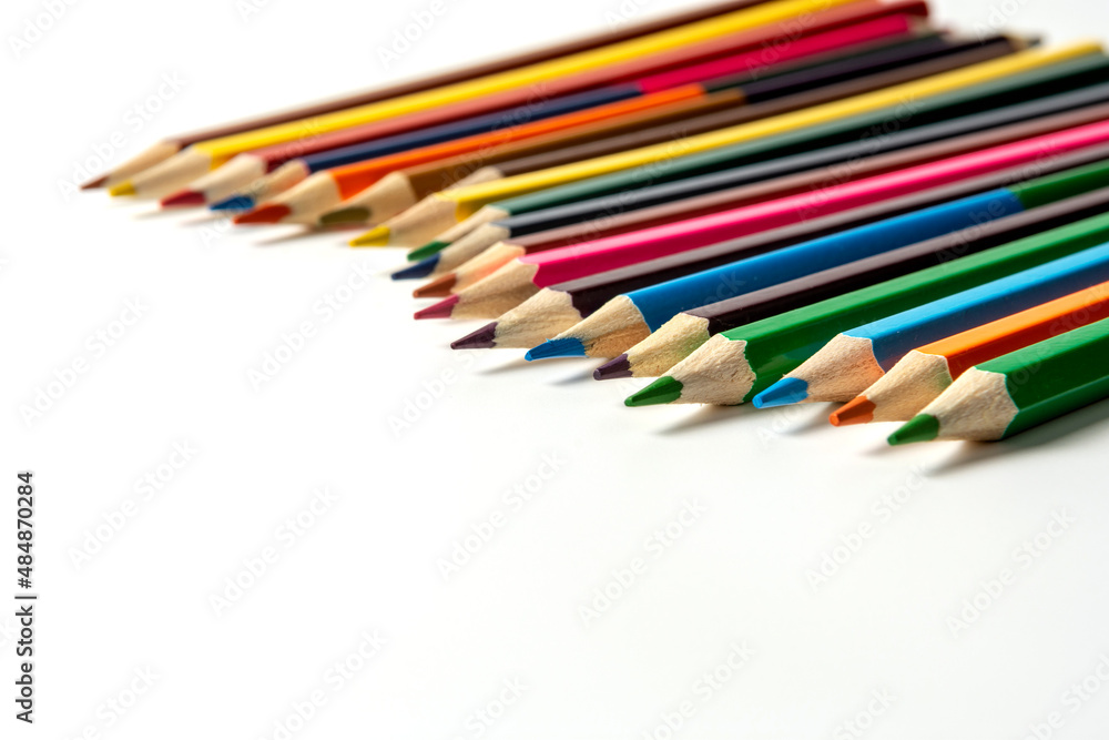 Colored pencils isolated on white background. close-up, copy space Colored pencils isolated on white background. close-up, copy space