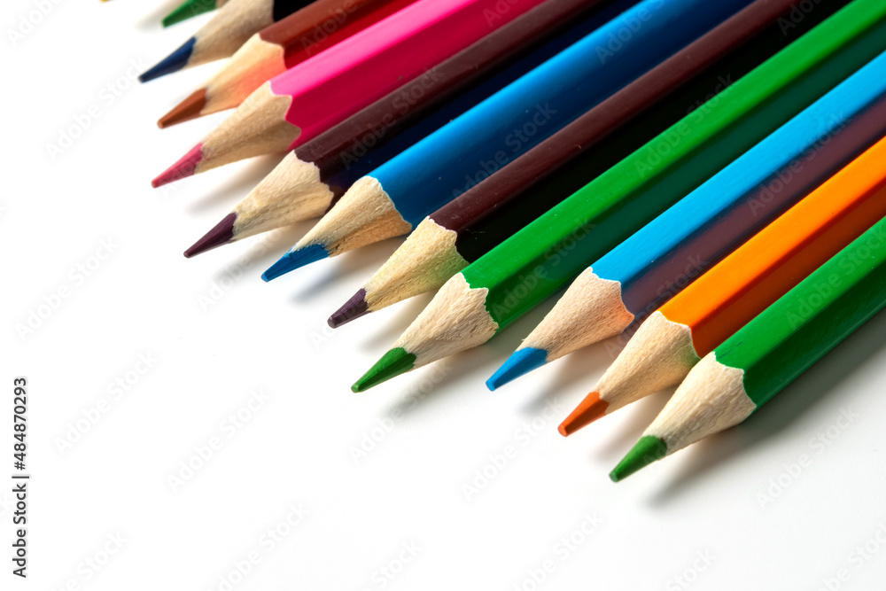 Colored pencils isolated on white background. close-up, copy space