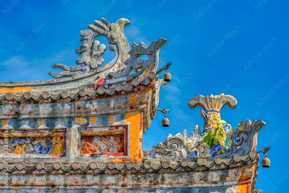 Decoration on gate of the Hien Lam Cac house in the Imperial City with the Purple Forbidden City within the Citadel in Hue, Vietnam. Imperial Royal Palace of Nguyen dynasty