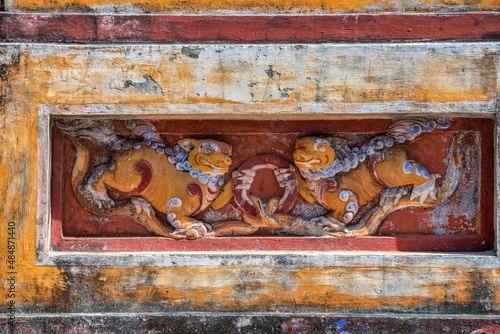 Decoration on gate of the Hien Lam Cac house in the Imperial City with the Purple Forbidden City within the Citadel in Hue, Vietnam. Imperial Royal Palace of Nguyen dynasty photo