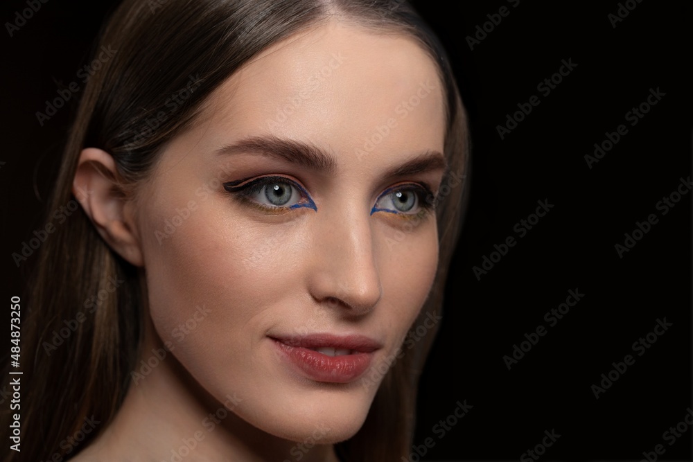 Head shot beautiful creative make up of smiling woman with long straight hair. Beauty, makeup and cosmetics concept Head shot beautiful creative make up of smiling woman with long straight hair. Beauty, makeup and cosmetics concept