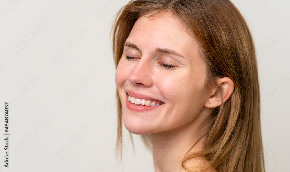 Portrait of pretty young woman over isolated white background Portrait of pretty young woman over isolated white background
