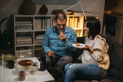 senior couple celebrating at home