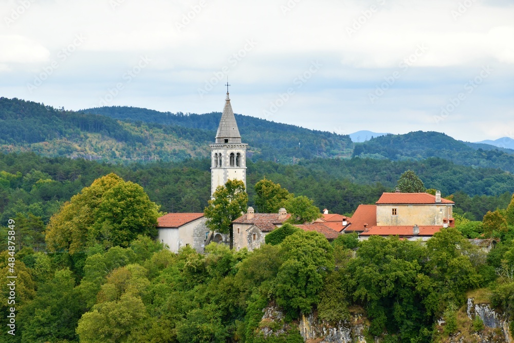 View of Skocjan village near Matavun in municipality of Divaca, Slovenia with Vremscica hill behind