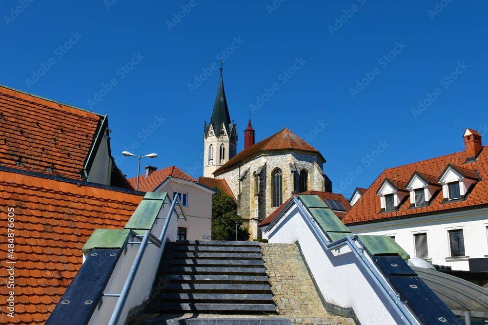 Novo Mesto cathedral or St Nicholas's cathedral landmark in Dolenjska, Slovenia with old buildings and a stairway in front Novo Mesto cathedral or St Nicholas's cathedral landmark in Dolenjska, Slovenia with old buildings and a stairway in front
