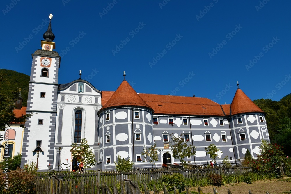 View of old medieval monastery complex at Olimje near Podcetrtek in Stajerska, Slovenia with a church tower