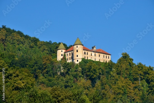 View of Podcetrtek castle surrounded by a forest in Stajerska, Slovenia