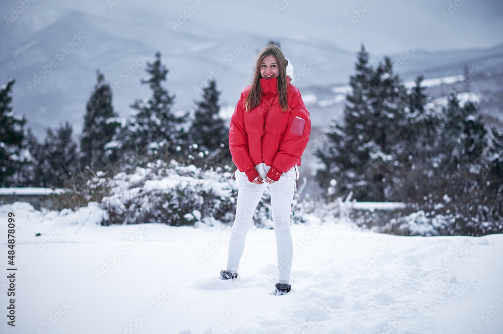 Beautiful girl and snowy forest Beautiful girl and snowy forest