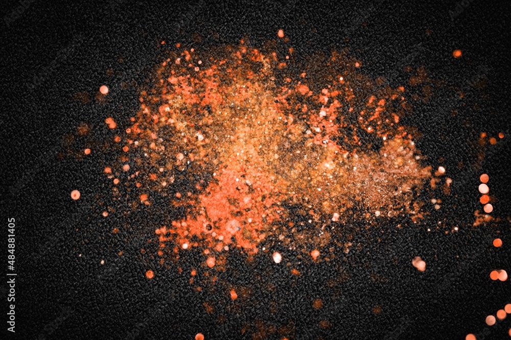 Explosion of various spices on dark background Explosion of various spices on dark background