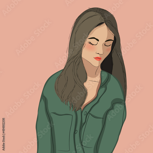 woman with long dark hair in a green shirt looking down