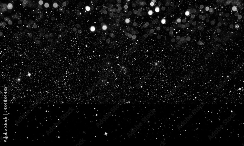 Best photo of falling medium sized snowflakes out of focus on black background Best photo of falling medium sized snowflakes out of focus on black background