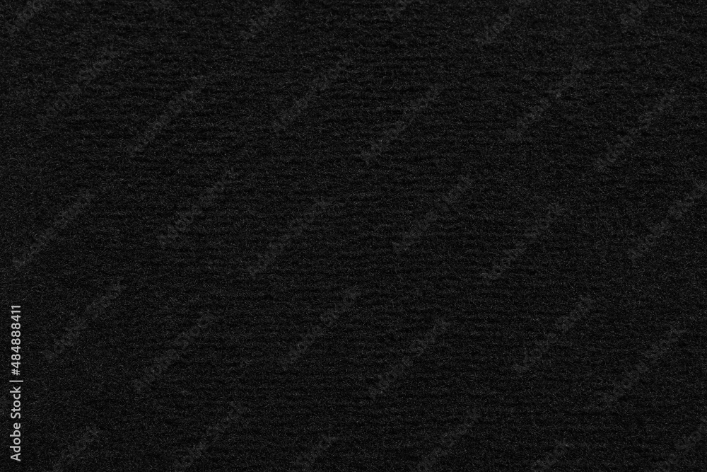 Texture of black car floor carpet as background, top view Texture of black car floor carpet as background, top view