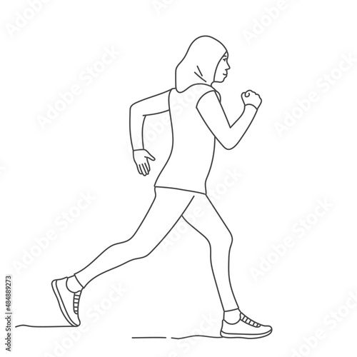 Muslim arab woman in hijab doing sports, running.