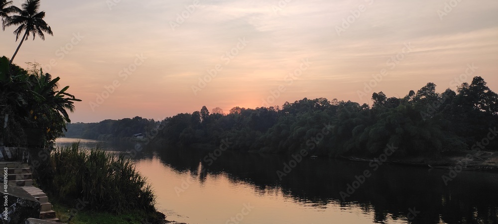 sunset over the river sunset over the river