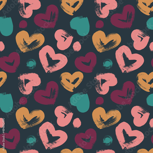 Seamless abstract pattern with hearts and dry brush strokes on a dark background.