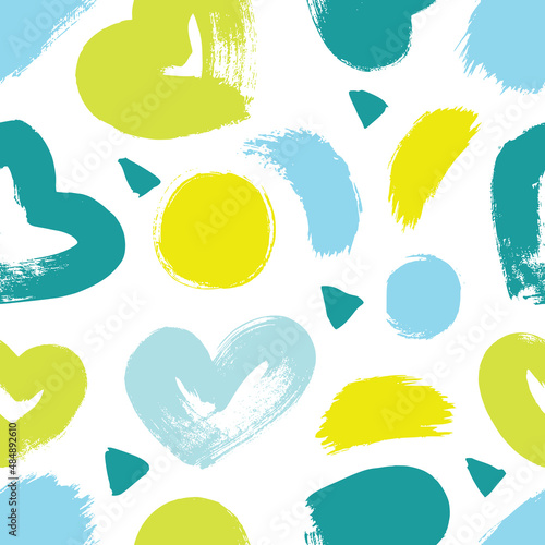 Seamless pattern with hearts in yellow and blue colors. Dry brush.