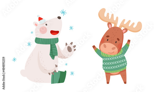 Happy animals celebrating Christmas set. Cute polar bear and reindeer in warm winter clothes vector illustration