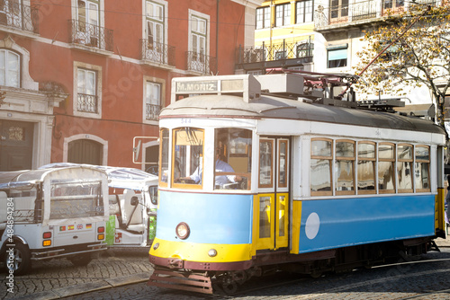 Typical lisbon tram with unrecognizable driver