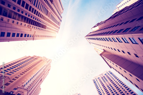Obraz na płótnie Abstract architectural image with skyscrapers on sky background. w salonie